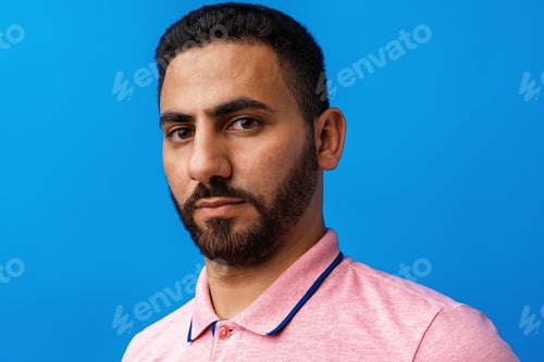 Preview: Close up portrait of young arab man in studio