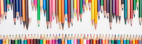 Preview: Panoramic shot of rows of sharpened color pencils