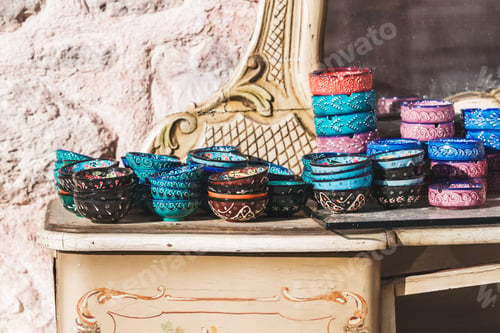 Preview: Stack of handmade multicolor Turkish dishes painted with oriental ornaments. Vintage plates