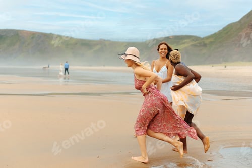 Preview: Three friends of different races spending a relaxed day at the beach