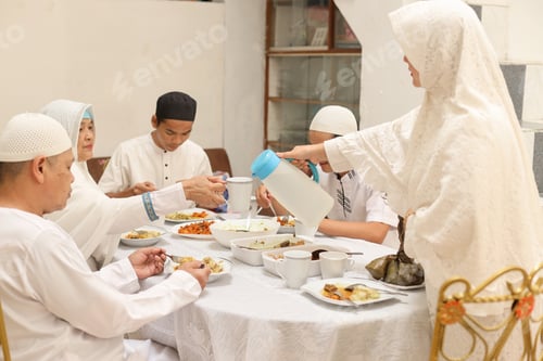 Preview: Muslim woman pouring water on eid moment