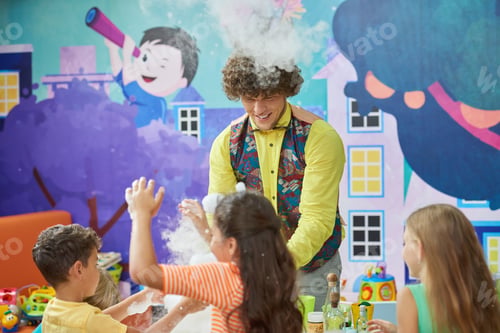 Preview: Joyful kids in entertainment center.