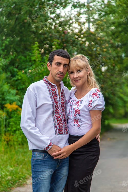 Preview: Ukrainian man and woman in vyshyvanka. Selective focus.