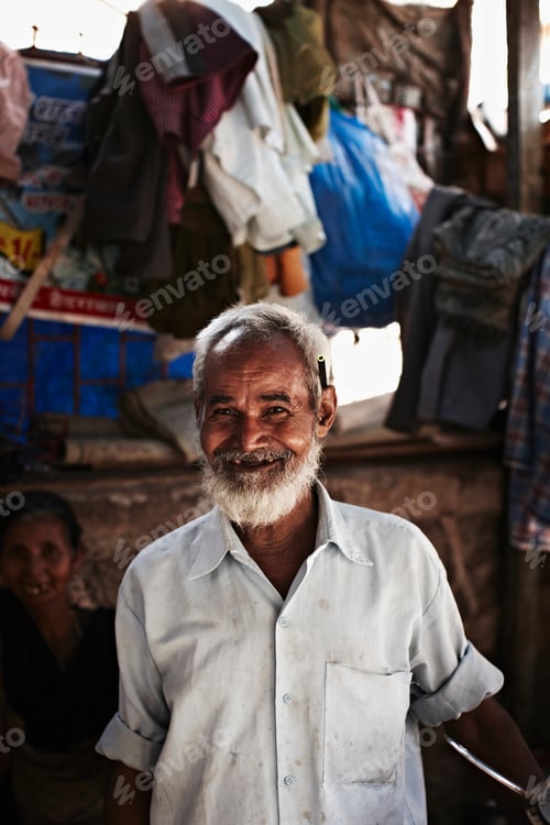Preview: Smiling older man standing outdoors
