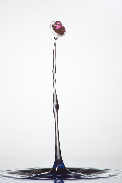 Preview: Splash of colorful liquid with high speed flash