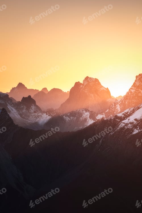 Preview: Radiant Sunrise over Alpine Peaks