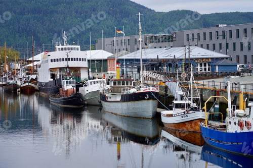 Preview: Boats docked at a picturesque harbor