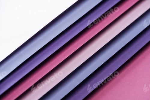 Preview: blue, white, pink and purple papers on pink background