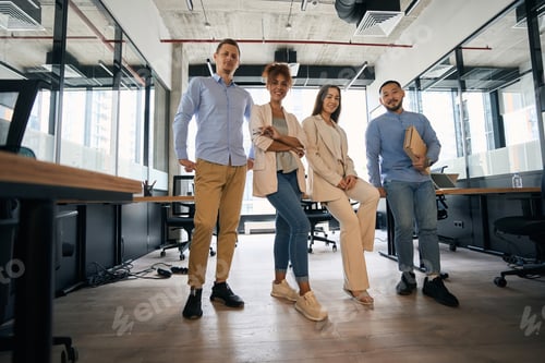 Preview: Photo of men and women in office with panoramic windows