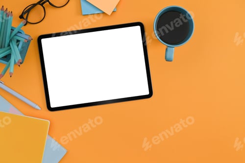Preview: Flat lay digital tablet, coffee cup, glasses and stationery on yellow background.