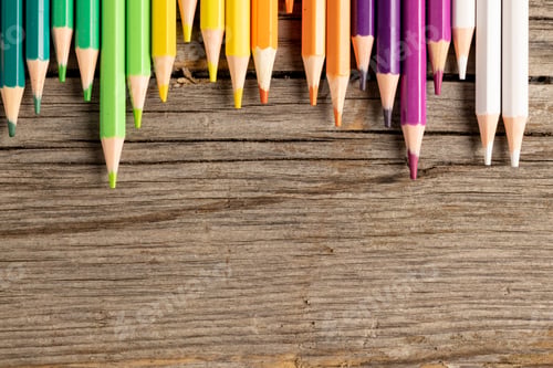 Preview: Composition of colorful crayons on wooden background