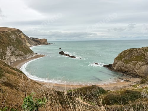 Preview: Man O'War Beach and Durdle Door on Jurassic Coast, Dorset, England.