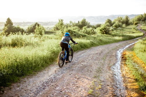 Preview: Cyclist riding on the mountain road