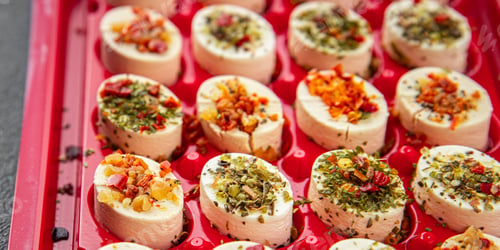 Preview: cheese appetizer soft cheese with herbs and tomatoes pieces fresh tasty food dish delicious gourmet