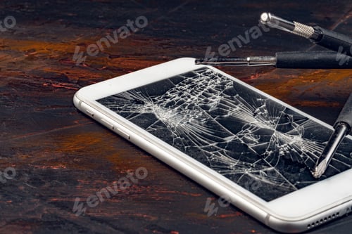 Preview: Smartphone repair concept. Damaged display of smartphone and tools