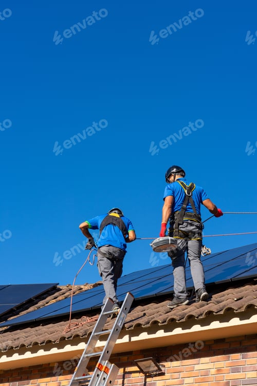 Preview: Solar panel installers putting solar energy into a house