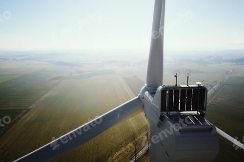 Preview: Aerial view of part of windmill turbine in countryside, Green energy