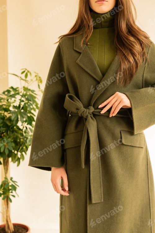 Preview: Hipster girl wearing modern green trench coat and dress