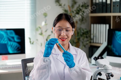 Preview: Scientist analyzing test tube with blue liquid in modern laboratory