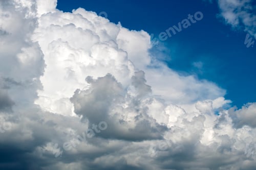 Preview: Bright landscape of blue sky with flying white clouds. Colorful summer skyscape