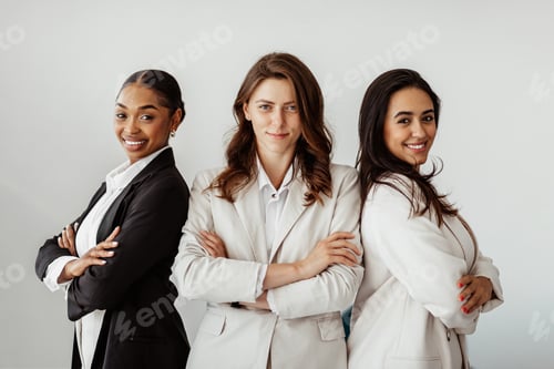 Preview: Successful Women Professionals Standing Together Confidently Indoors