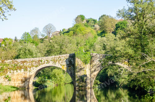 Preview: stone bridge over the Arnoia river in the medieval village of Allariz, Galicia. Spain