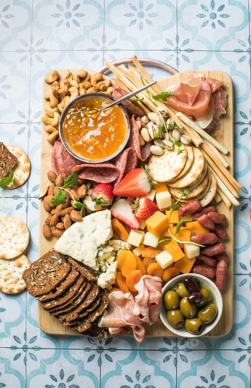 Preview: Antipasto meat board. catering platter with jamon, sausage and cheese. Food recipe background.