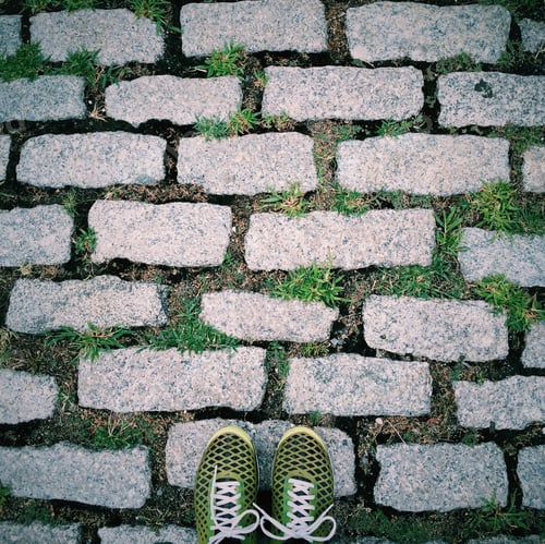 Preview: The grid. Stone street with green shoes