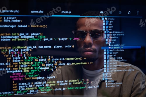 Preview: Developer Debugging Code in Dark Office Environment