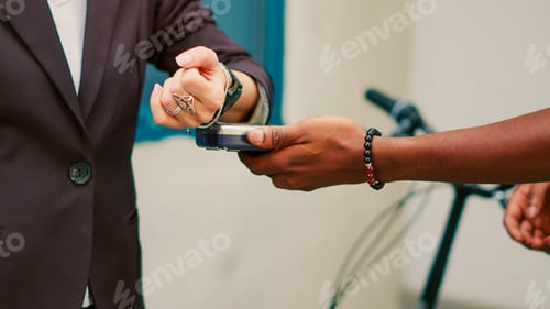 Preview: Takeaway courier giving fastfood order to customer