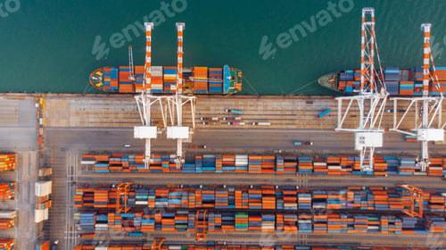 Preview: Smart crane loanding cargo container to container ship in the international terminal depot sea