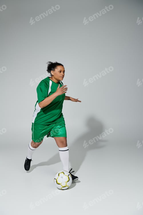 Preview: A Green Jerseyed Athlete Dribbles the Ball