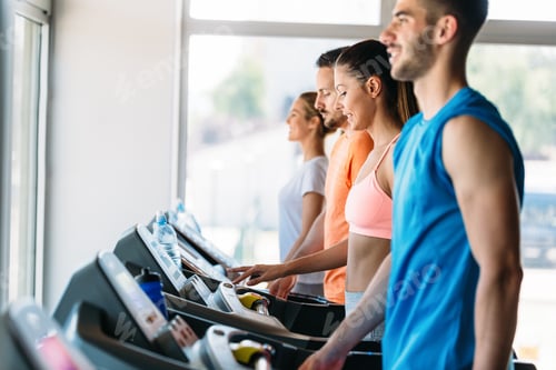 Preview: Picture of cheerful fitness team in gym