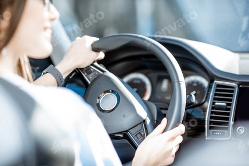 Preview: Woman driving a car