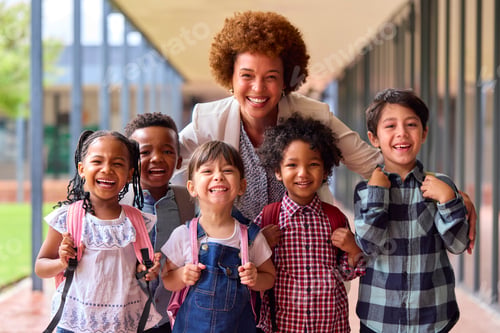 Preview: Portrait Of Multi-Cultural Elementary School Pupils With Female Teacher Outdoors At School