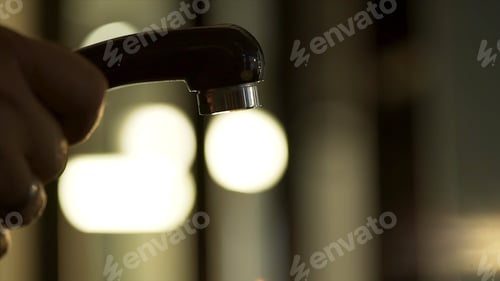 Preview: Process of washing your hair in a hairdresser: Close-up a hairdresser washes a client's head for a
