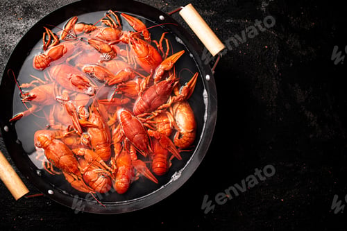 Preview: Boiled crayfish in a pot of water.