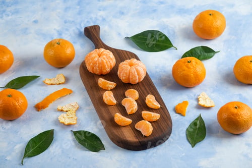 Preview: Pile of clementine mandarins whole or peeled