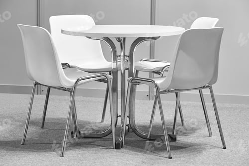 Preview: White chairs and table indoor set. Contemporary comfortable plastic furniture