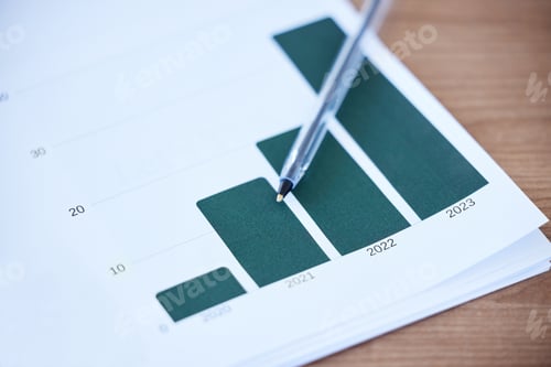 Preview: Shot of paperwork and stationery on a desk in an empty office during the day