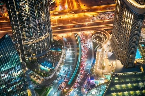Preview: Aerial View Of Urban Background Of Illuminated Cityscape With Towers In Dubai. Street Night Traffic