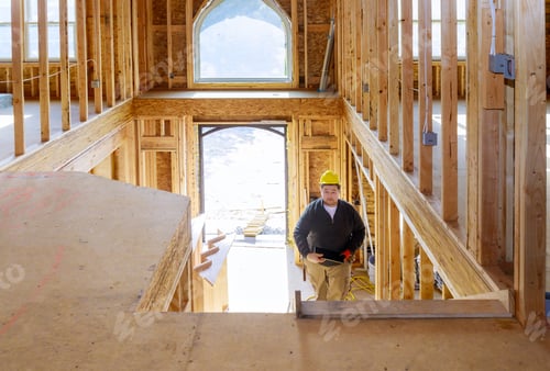 Preview: Construction Worker Inspecting New Home Construction Site
