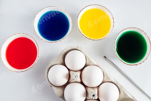 Preview: The process of preparing for painting eggs for Easter on a white background.