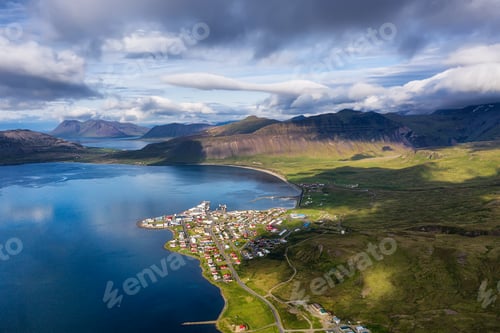 Preview: Iceland. Aerial view on the mountain, ocean and town. Landscape from drone.