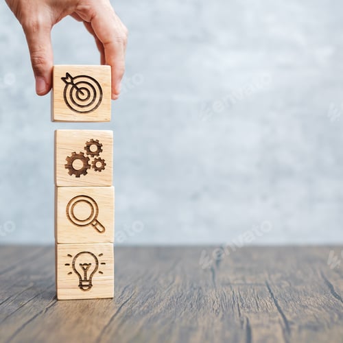 Preview: hand hold wood block with business goal, strategy, target, mission, action, objective, teamwork, res