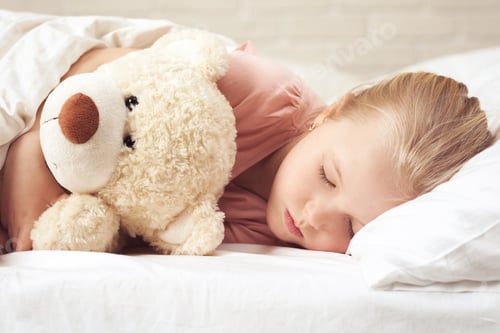 Preview: Cute little child girl sleeping with teddy bear