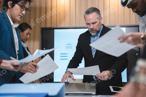 Preview: diverse business team leader discuss financial paperwork, Smart businessman and businesswoman