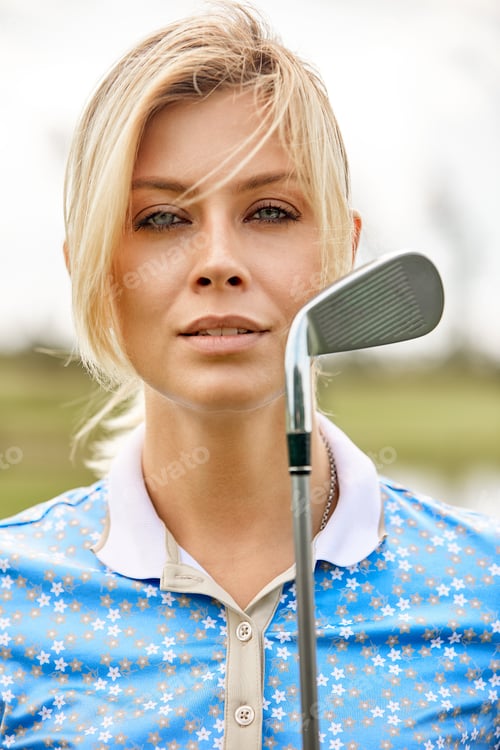 Preview: Portrait of a beautiful woman playing golf on a green field outdoors background. The concept of golf