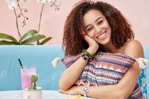 Preview: Positive African American female student feels relief after passing summer session, celebrates endin