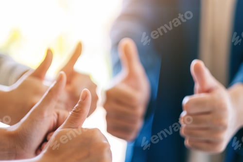Preview: People making thumb up sign in circle